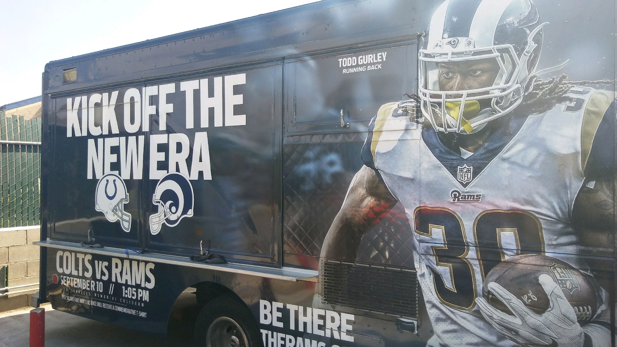The Lime Truck Los Angeles Rams brand activation food truck — fully wrapped vinyl design featuring Rams running back Todd Gurley, 'Kick Off the New Era' campaign signage, and the September 10 LA Memorial Coliseum season opener date. Two-month branded fan tour produced and operated by The Lime Truck.